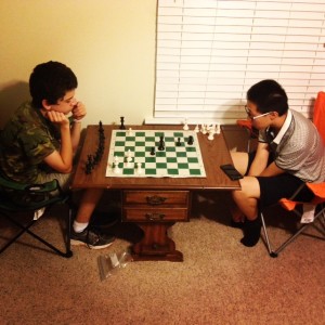 Reed and David playing chess.